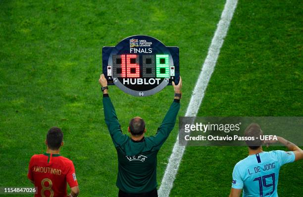 The LED board is used to indicate a substitution during the UEFA Nations League Final between Portugal and the Netherlands at Estadio do Dragao on...
