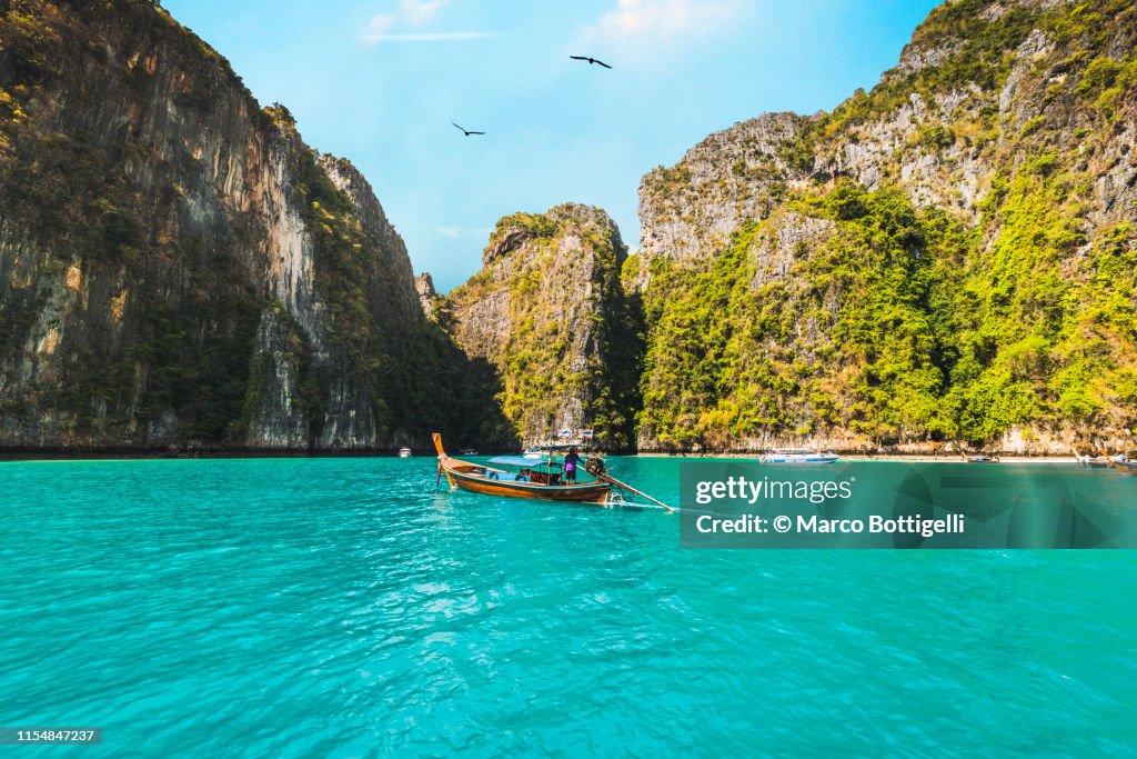 Longtail boats in Pileh lagoon, Phi Phi Islands, Thailand