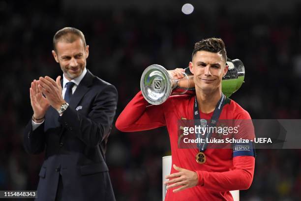 Cristiano Ronaldo of Portugal celebrates with the UEFA Nations League Trophy following his team's victory in the UEFA Nations League Final between...