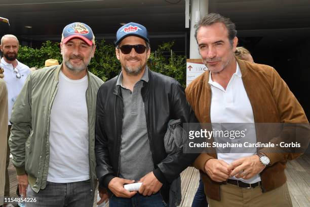Gilles Lellouche, Guillaume Canet and Jean Dujardin attend the 2019 French Tennis Open - Day Fithteen at Roland Garros on June 09, 2019 in Paris,...