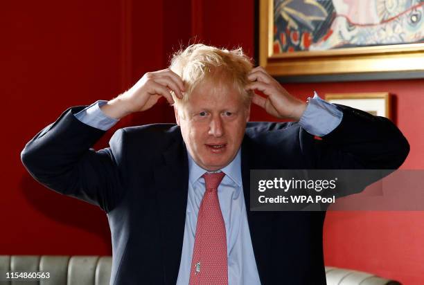 Boris Johnson, a leadership candidate for Britain's Conservative Party, visits Wetherspoons Metropolitan Bar to meet with JD Wetherspoon chairman Tim...