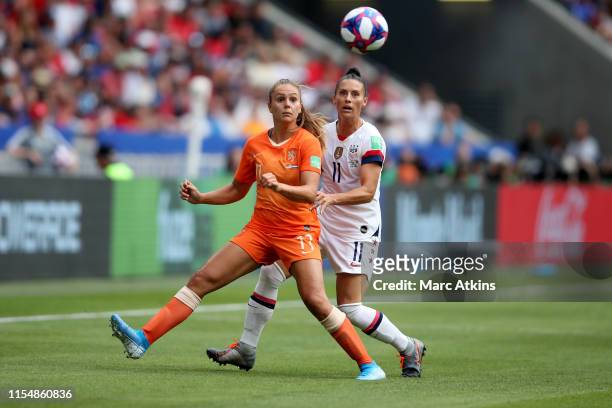 Lieke Martens of Netherlands in action with Ali Krieger of USA during the 2019 FIFA Women's World Cup France Final match between The United States of...