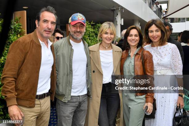 Jean Dujardin, Gilles Lellouche, Alizee Guinochet, Nathalie Pechalat and Elsa Zylberstein attend the 2019 French Tennis Open - Day Fifteenth at...