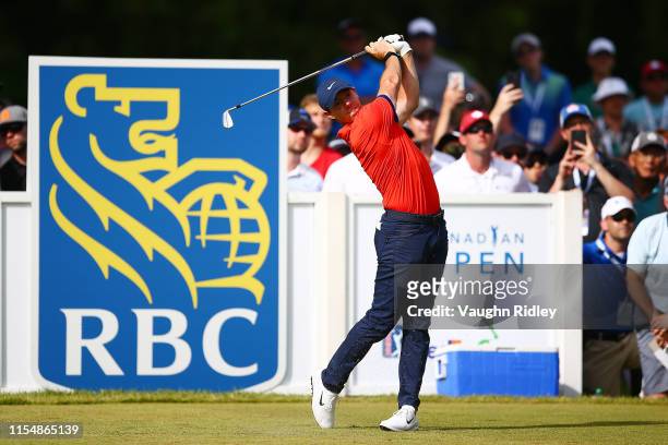 Rory McIlroy of Northern Ireland plays his shot from the 16th tee during the final round of the RBC Canadian Open at Hamilton Golf and Country Club...