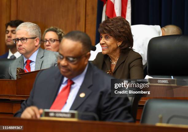 Representative Maxine Waters, a Democrat from California and chairwoman of the House Financial Services Committee, right, and Representative Patrick...