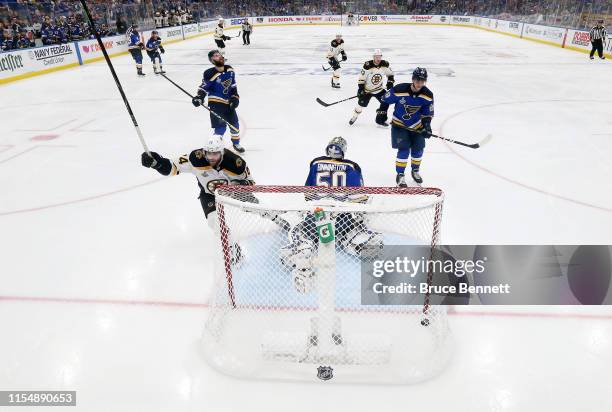 Jordan Binnington of the St. Louis Blues allows a third period goal to Brandon Carlo of the Boston Bruins in Game Six of the 2019 NHL Stanley Cup...