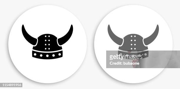 viking helm schwarze und weiße runde ikone - viking helmet stock-grafiken, -clipart, -cartoons und -symbole