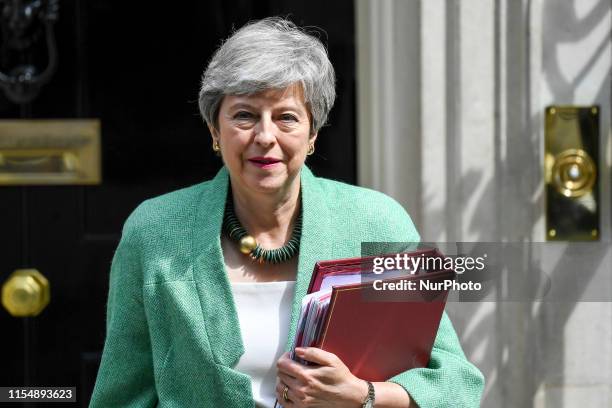 British Prime Minister Theresa May leaves 10 Downing Street, as she makes her way to the House of Commons to attend weekly Prime Ministers Questions...