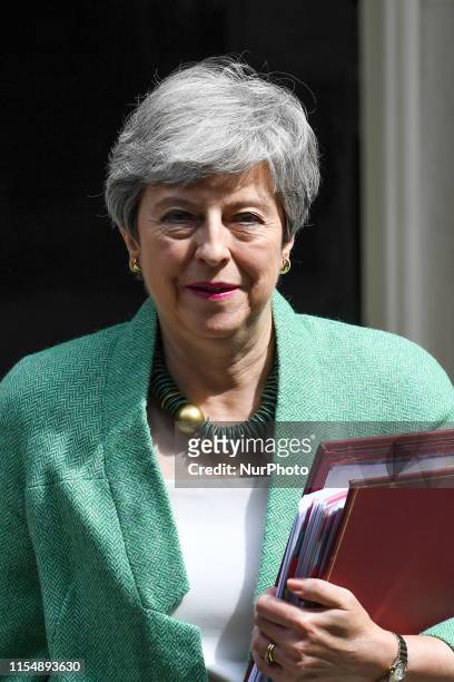 British Prime Minister Theresa May leaves 10 Downing Street, as she makes her way to the House of Commons to attend weekly Prime Ministers Questions...