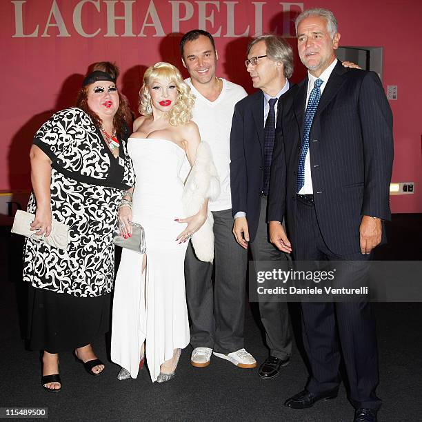 An unidentified guest, Amanda Lepore, David LaChapelle, photographer, Vittorio Sgarbi and Roberto Formigoni attend the David LaChapelle opening...