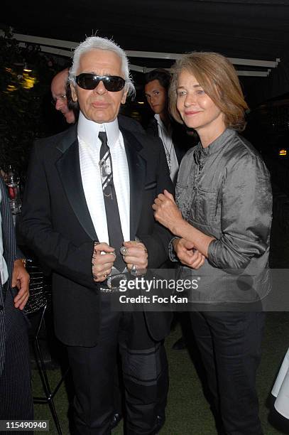 August 19: Karl Lagerfeld and Charlotte Rampling attend the DJ Martin Solveig Mix Experience Party VIP Room on August 19, 2007 in St Tropez, France.