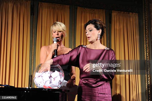 Alessia Marcuzzi and Edwige Fenech attend the Gala Dinner Il Faro: Charity Event on May 27, 2010 in Rome, Italy.