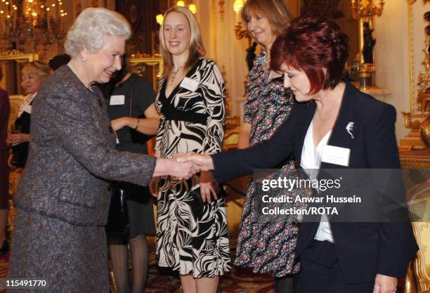 Queen Elizabeth II shakes hands with Sharon Osbourne at the Women in Business Reception at Buckingham Palace on February 14, 2007 *** Local Caption