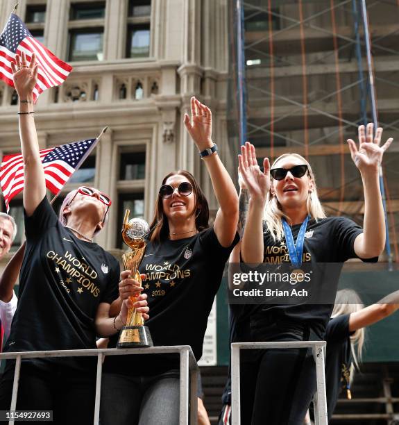 Members Megan Rapinoe, Alex Morgan, and Allie Long are seen during the U.S. Women's National Soccer Team Victory Parade on July 10, 2019 in New York...