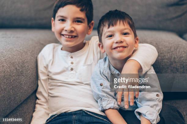 brothers - sibling stock pictures, royalty-free photos & images