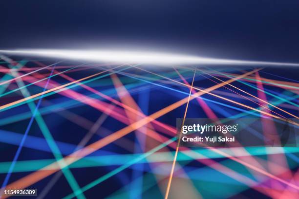 crossing rainbow color strings - business computer network stock pictures, royalty-free photos & images