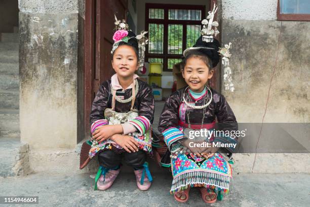 schoolgirls together traditional dong clothing, china - traditional clothing stock pictures, royalty-free photos & images