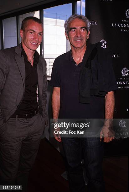 Footballer Matthieu Chalme and football Coach Raymond Domenech attend the Chateau Connivence 2008 Pomerol Wine Launch Cocktail at the Terrasse M6 on...