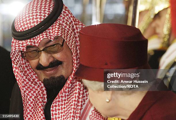 King Abdullah of Saudi Arabia and Queen Elizabeth ll arrive at Buckingham Palace following a ceremonial welcome on October 30, 2007 in London,...