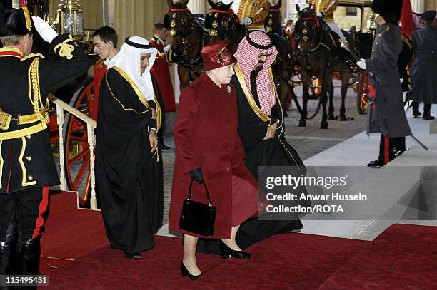 Queen Elizabeth ll and King Abdullah of Saudi Arabia arrive at Buckingham Palace following a ceremonial welcome on October 30, 2007 in London,...