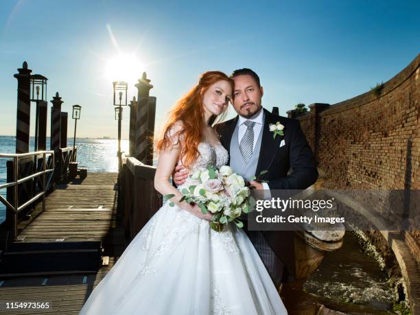 Barbara Meier and Klemens Hallmann pose for a picture during their wedding celebration of Barbara Meier and Klemens Hallmann on June 01, 2019 in...