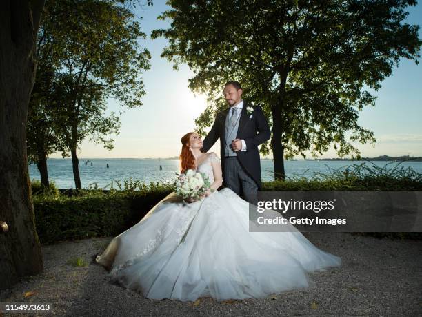 Barbara Meier and Klemens Hallmann pose for a picture during their wedding celebration of Barbara Meier and Klemens Hallmann on June 01, 2019 in...