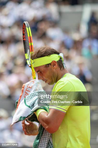 June 09. Rafael Nadal of Spain in action against Dominic Thiem of Austria during the Men's Singles Final on Court Philippe-Chatrier at the 2019...