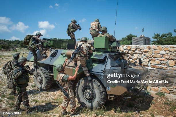 Soldiers on a vehicle during the preparation in the Canjuers camp of French soldiers leaving for four months of Opex in Mali as part of the operation...