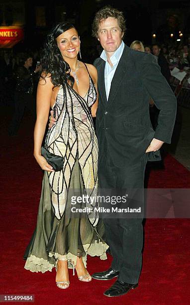 Martine McCutcheon and Hugh Grant during "Love Actually" London Premiere - Arrivals at The Odeon Leicester Square in London, United Kingdom.