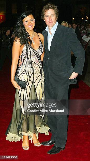 Martine McCutcheon and Hugh Grant during "Love Actually" London Premiere - Arrivals at The Odeon Leicester Square in London, United Kingdom.