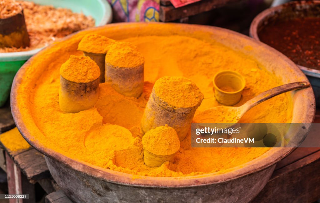 Pot of Turmeric powder at Terong Street Market in Makassar, South Sulawesi, Indonesia.