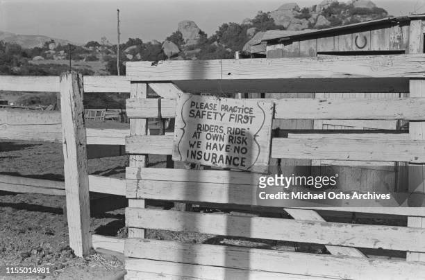 Safety sign at the entrance of a fence at the Spahn Movie Ranch, owned by American rancher George Spahn and residence of the Manson Family, Los...