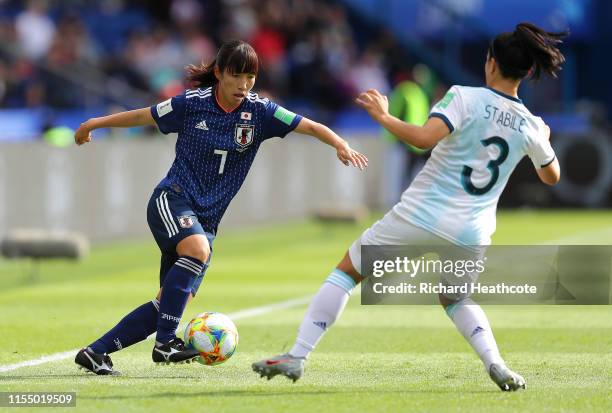 Emi Nakajima of Japan takes on Eliana Stabile of Argentina during the 2019 FIFA Women's World Cup France group D match between Argentina and Japan at...