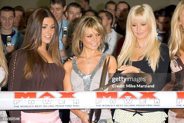 Lucy Pinder, Jakki Degg and Michelle Marsh during Max Power Live 2004 at Excel Center in London, Great Britain.