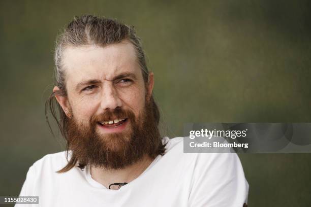 Mike Cannon-Brookes, co-founder and chief executive officer of Atlassian Corp., speaks during a Bloomberg Television interview on the sidelines of...