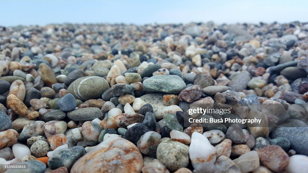 Closeup of beautiful pebbles on a beach in Sicily, Italy