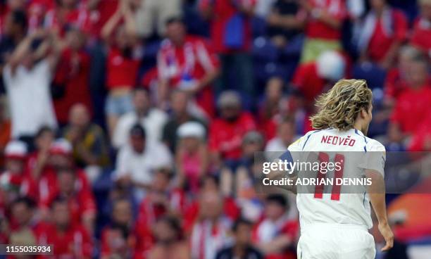 Czech captain Pavel Nedved walks off the pitch after picking up an injury, 01 July 2004 during their European Nations championship semi-final...