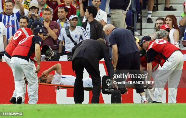 Czech captain Pavel Nedved is taken off the pitch on a stretcher after picking up an injury, 01 July 2004 during the European Nations championship...