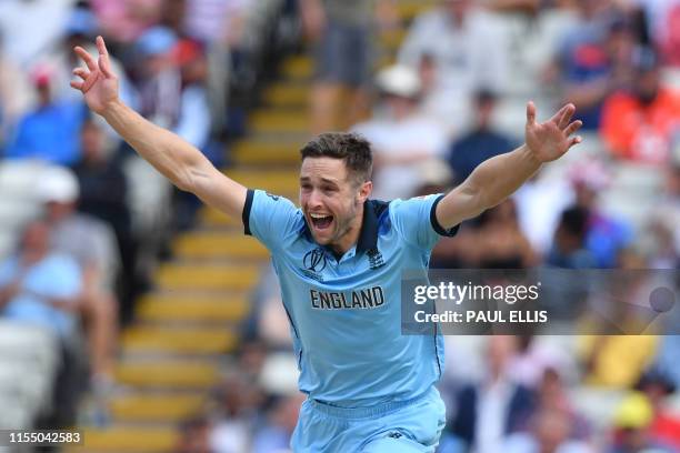 England's Chris Woakes makes an unsuccessful appeal for the wicket of Australia's Peter Handscomb during the 2019 Cricket World Cup second semi-final...