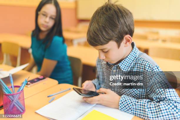 Kids Using Phones In Class 4,857 Smartphone In Classroom Stock Photos, High-Res Pictures, and ...