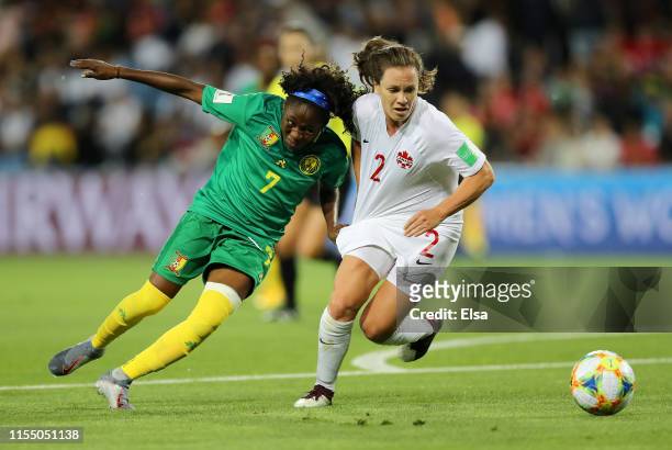 Gabrielle Aboudi Onguene of Cameroon battles for possession with Allysha Chapman of Canada during the 2019 FIFA Women's World Cup France group E...