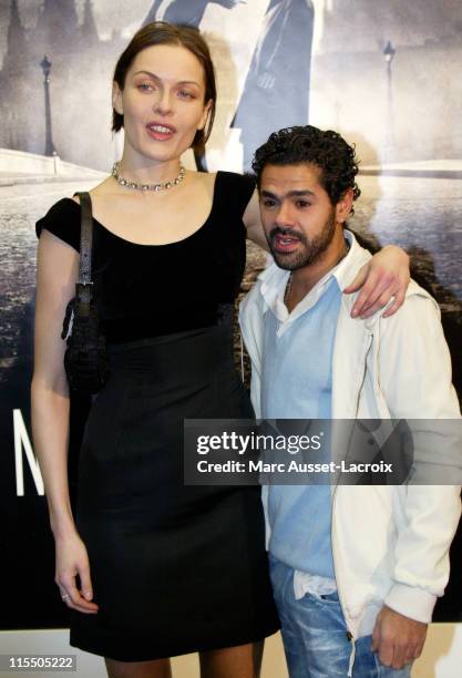 Rie Rasmussen and Jamel Debbouze during "Angel-A" Paris Premiere - Arrivals at Gaumont-Marignan in Paris, France.