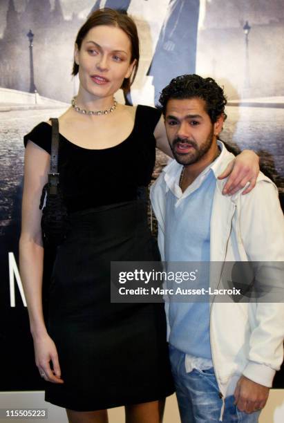 Rie Rasmussen and Jamel Debbouze during "Angel-A" Paris Premiere - Arrivals at Gaumont-Marignan in Paris, France.