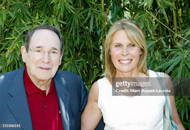 Robert Hossein and his wife Candice Patou during 2006 French Open - Celebrity Sightings - June 9, 2006 at The Village, Roland Garros in Paris, France.