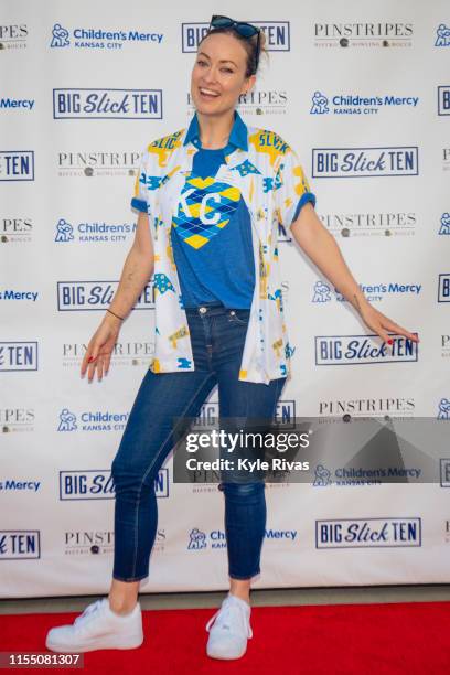 Olivia Wilde walks the red carpet at Pinstripes during the Big Slick Celebrity Weekend benefiting Children's Mercy Hospital of Kansas City on June...