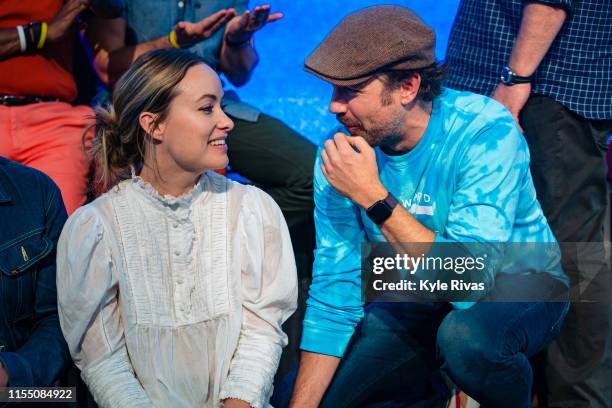 Olivia Wilde and Jason Sudeikis participate in the Celebrity Auction at the Sprint Center during the Big Slick Celebrity Weekend benefiting...