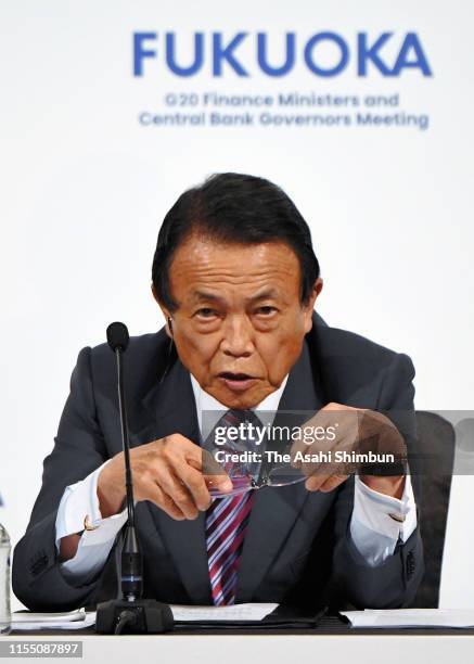 Japanese Finance Minister Taro Aso attends a press conference following the G20 Finance Ministers and Central Bank Governors meeting on June 09, 2019...