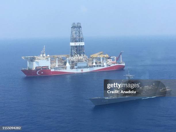 An aerial photo shows Turkish-flagged drill ship Yavuz' continue offshore drilling operations in company with Turkish battleship in the west of the...