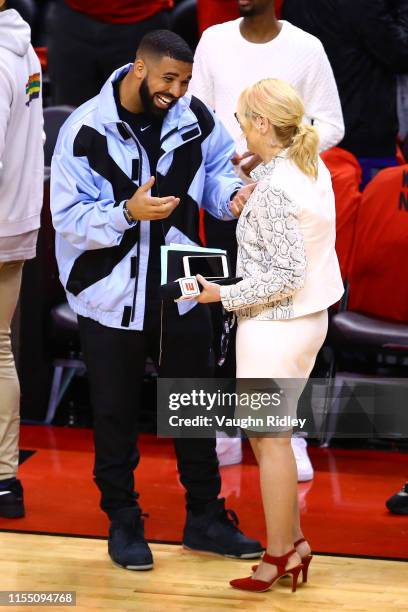 Rapper Drake speaks to TV personality Doris Burke before Game Five between the Toronto Raptors and the Golden State Warriors of the 2019 NBA Finals...