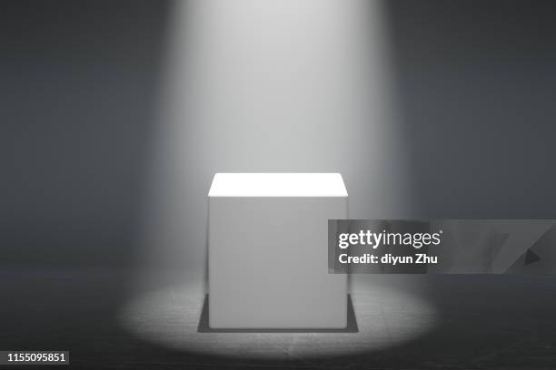 blocks of white podium with spotlight - stage performance space stock pictures, royalty-free photos & images